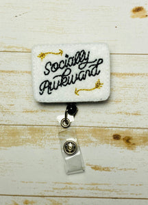 Socially awkward retractable badge-reel, lanyard is clip,