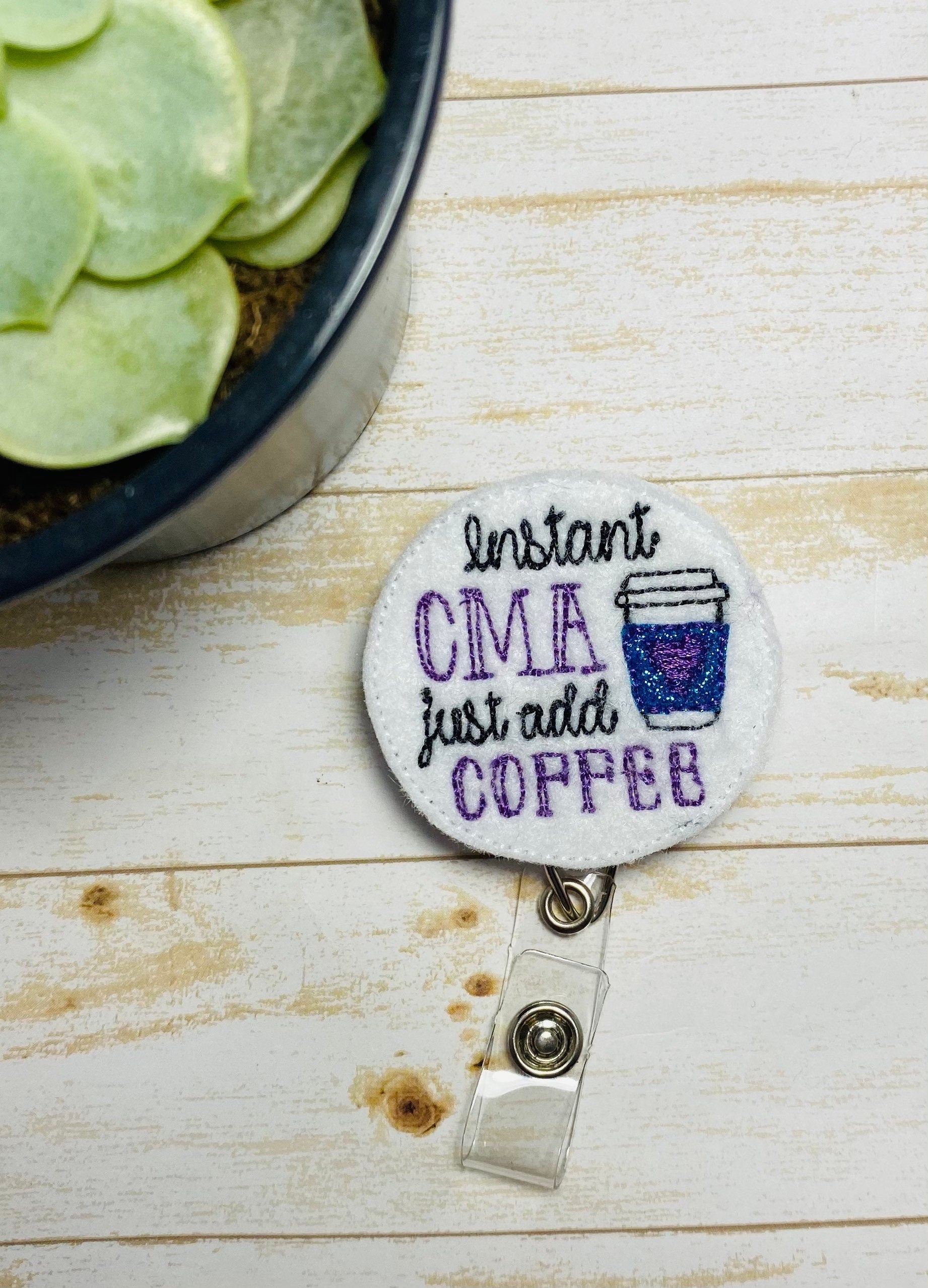 CMA retractable badge reel