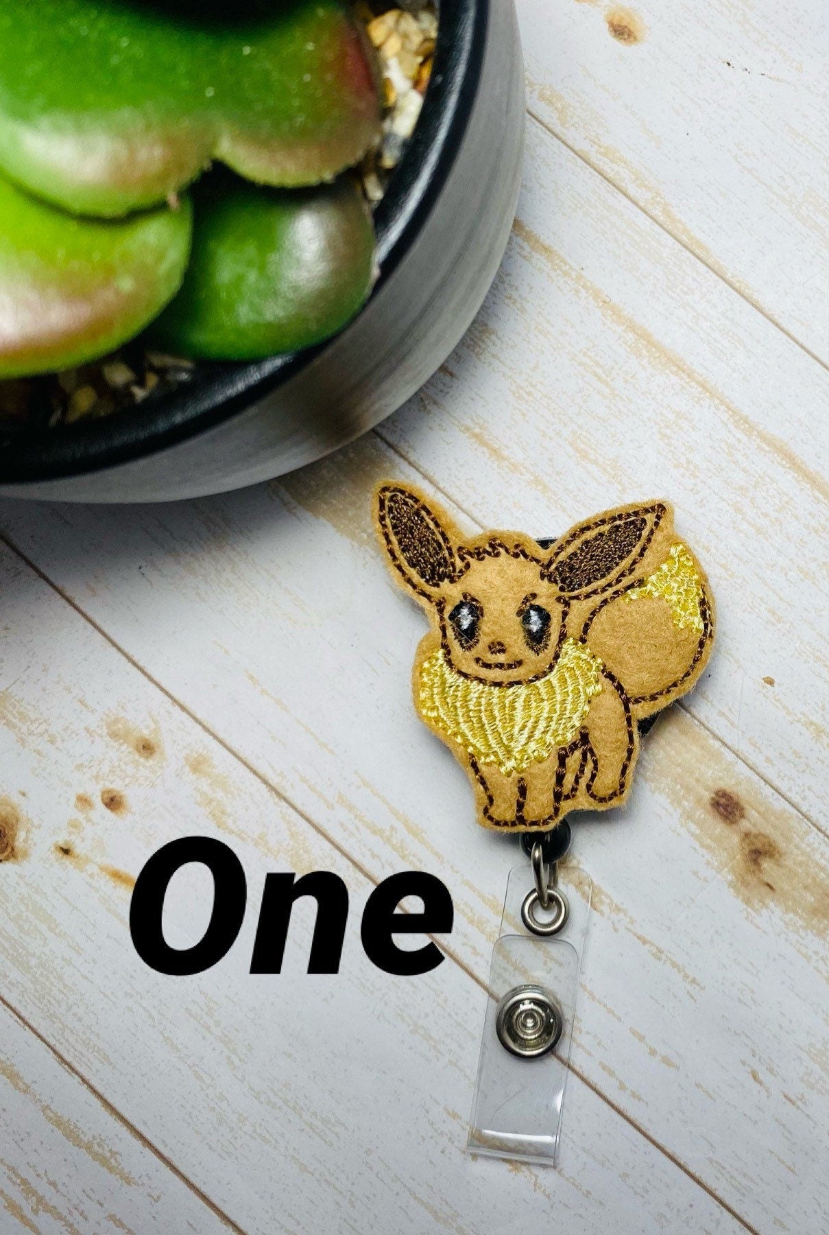 Monster Catch them all badge reels, one