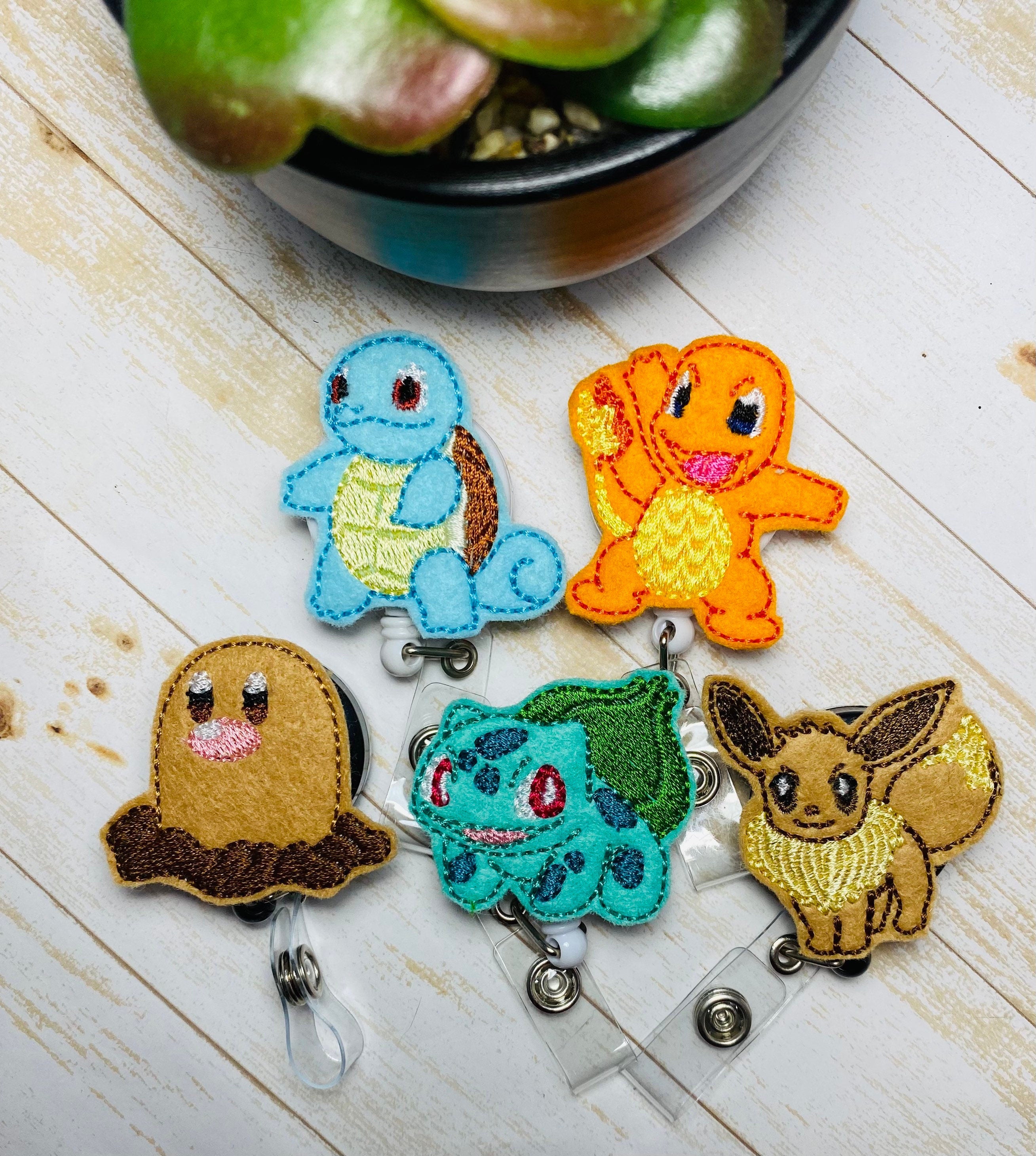 Monster Catch them all badge reels, two