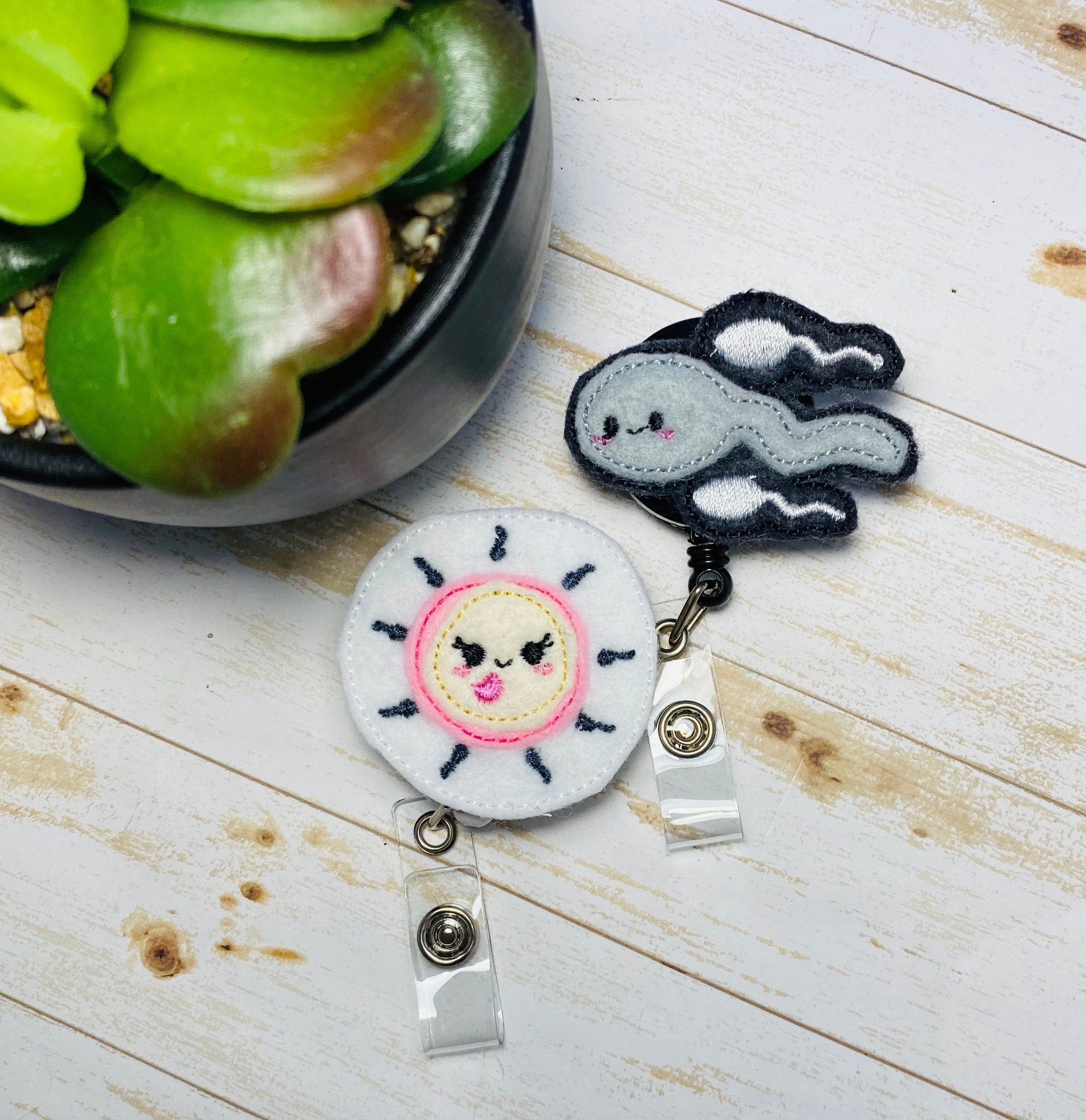 Reproductive sperm and egg ovum retractable badge reel both