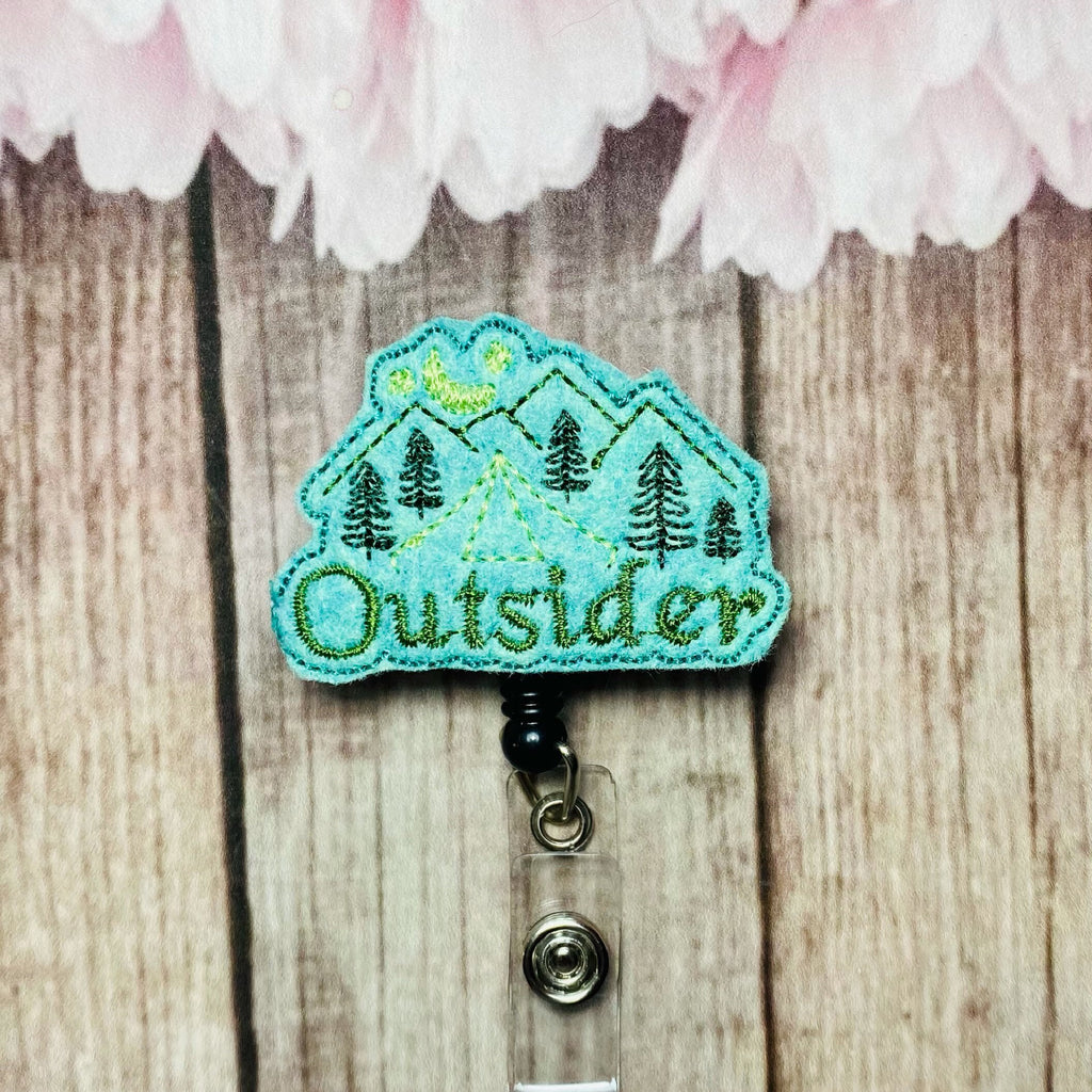 Outsider retractable badge reel