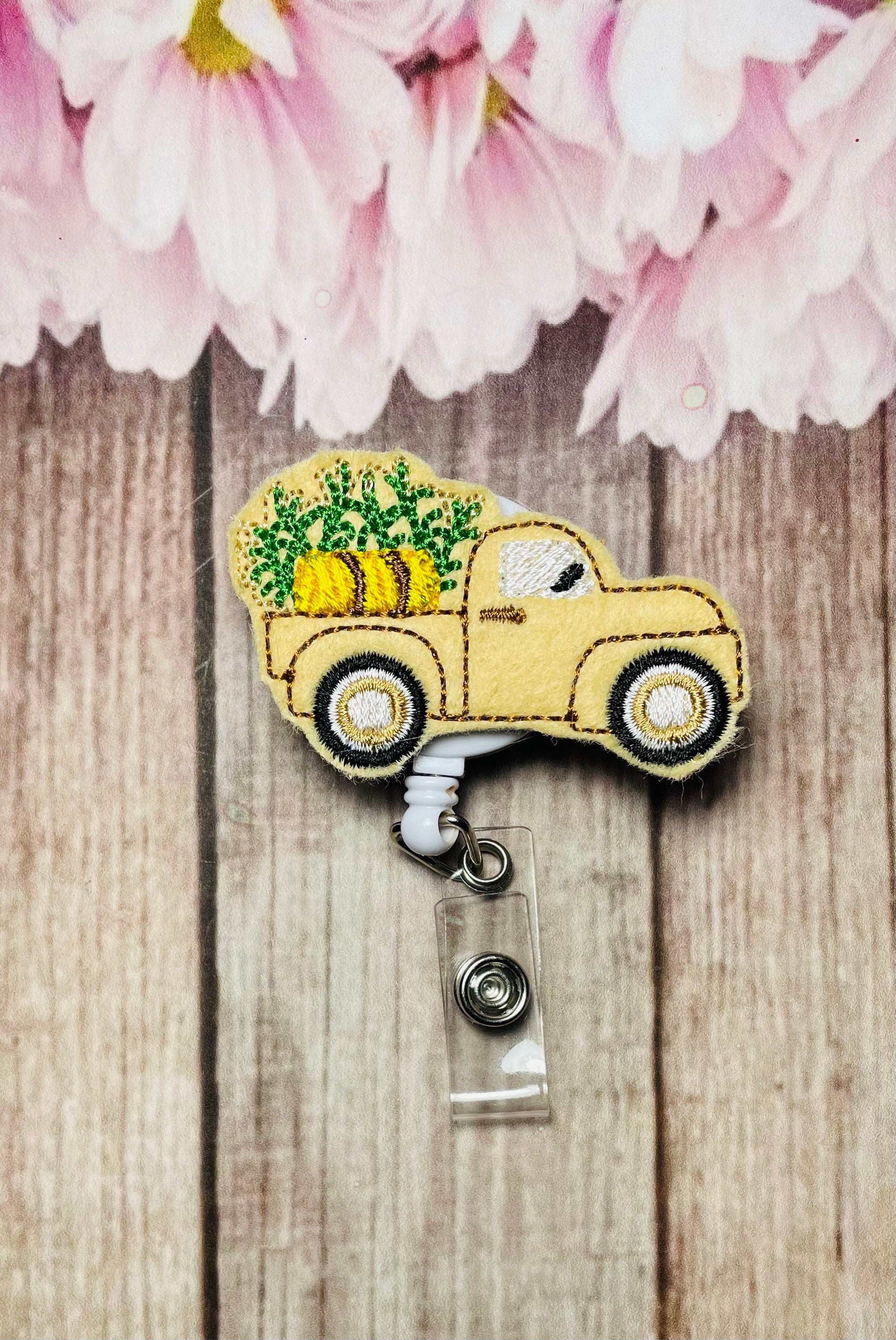 Vintage Fall truck retractable badge reel,